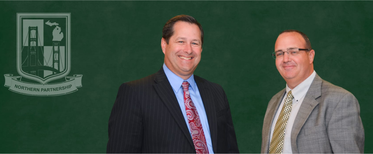 Northern Managing Partners Jim Camp and Joe Blanchard with background of Northern Partnership crest.