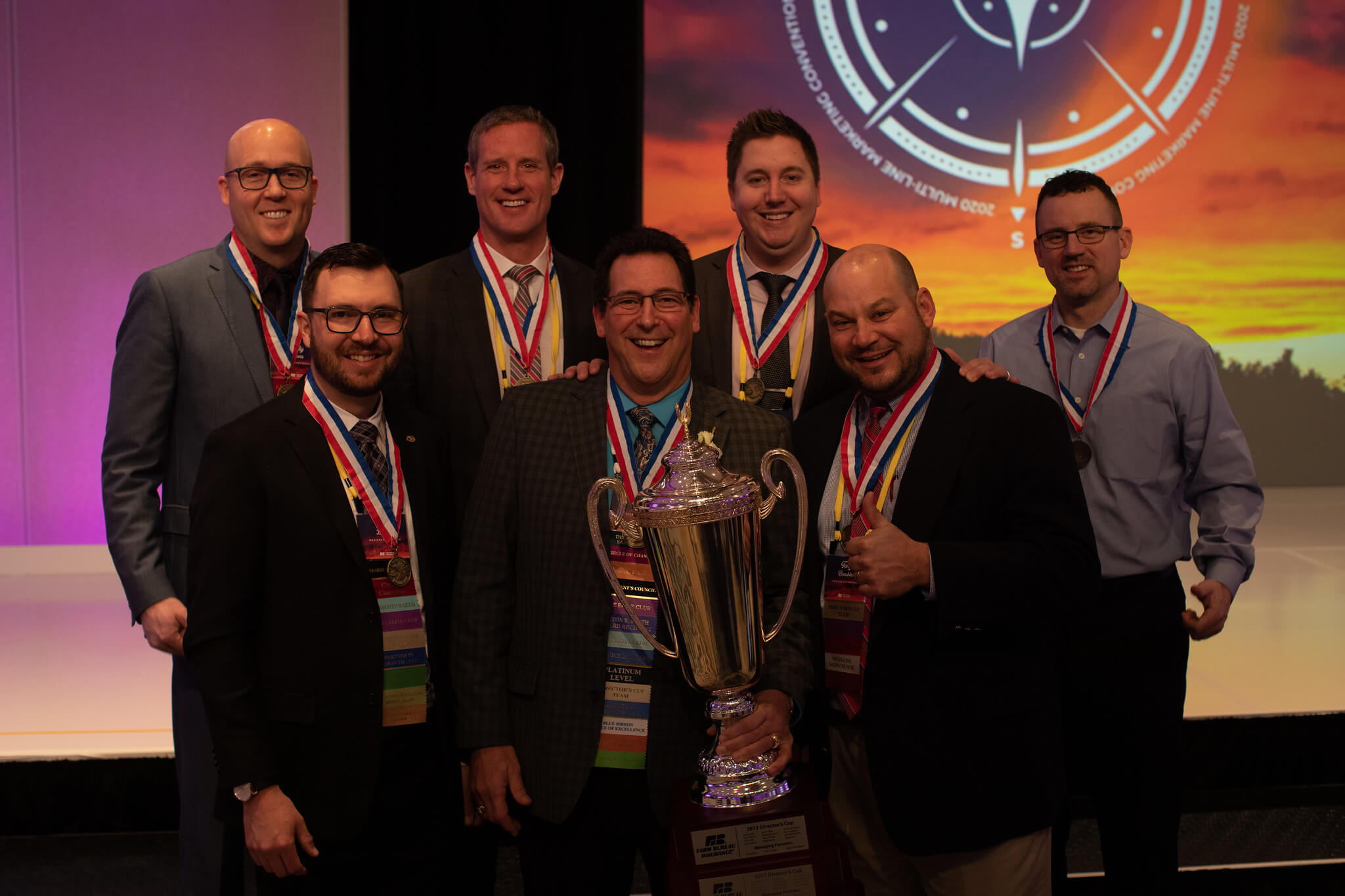 Andy Spears, Patrick Carpenter, Kaleb Klotz, Jason Parks, Derek Lietzau, Mark Hop, and Tony Beachler—all western Michigan Farm Bureau Insurance agents.