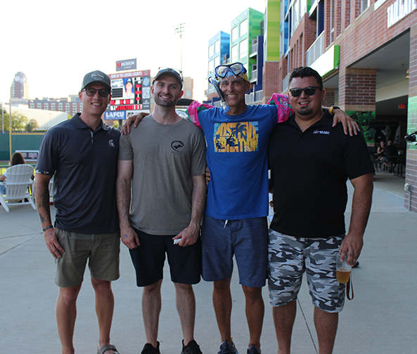 Mark Thompson with Central/Bay-Thumb agents cheering on the Lansing Lugnuts at Jackson Field. 